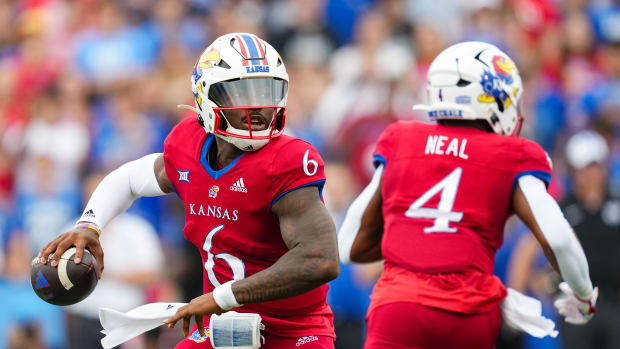 Kansas Jayhawks quarterback Jalon Daniels (6) throws a pass during the first half. Jay Biggerstaff-USA TODAY Sports