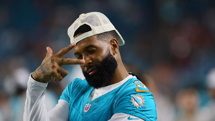 Miami Dolphins wide receiver Odell Beckham Jr reacts from the sideline against the Washington Commanders during the preseason