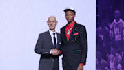 Jun 25, 2025; Brooklyn, NY, USA;  Ace Bailey stands with NBA commissioner Adam Silver after being selected as the fifth pick by the Utah Jazz in the first round of the 2025 NBA Draft at Barclays Center. Mandatory Credit: Brad Penner-Imagn Images