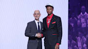Jun 25, 2025; Brooklyn, NY, USA;  Ace Bailey stands with NBA commissioner Adam Silver after being selected as the fifth pick by the Utah Jazz in the first round of the 2025 NBA Draft at Barclays Center. Mandatory Credit: Brad Penner-Imagn Images