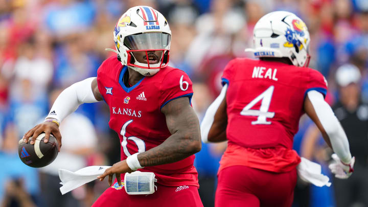 Sep 23, 2023; Lawrence, Kansas, USA; Kansas Jayhawks quarterback Jalon Daniels (6) throws a pass during the first half against the Brigham Young Cougars at David Booth Kansas Memorial Stadium. Mandatory Credit: Jay Biggerstaff-USA TODAY Sports