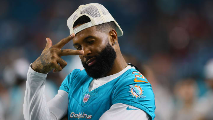 Miami Dolphins wide receiver Odell Beckham Jr. (3) reacts from the sideline against the Washington Commanders during the fourth quarter of a preseason game at Hard Rock Stadium.