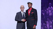 Jun 25, 2025; Brooklyn, NY, USA;  Ace Bailey stands with NBA commissioner Adam Silver after being selected as the fifth pick by the Utah Jazz in the first round of the 2025 NBA Draft at Barclays Center. Mandatory Credit: Brad Penner-Imagn Images