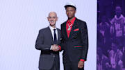 Ace Bailey stands with NBA commissioner Adam Silver after being selected as the fifth pick by the Utah Jazz in the first round of the 2025 NBA Draft at Barclays Center. 