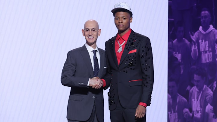Ace Bailey stands with NBA commissioner Adam Silver after being selected as the fifth pick in the 2025 NBA draft by the Utah Jazz.