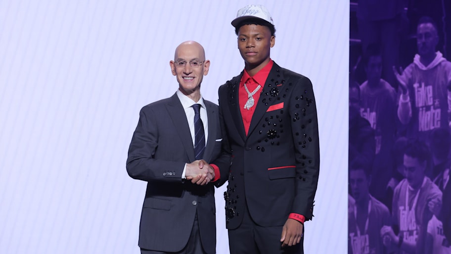 Ace Bailey stands with NBA commissioner Adam Silver after being selected as the fifth pick in the 2025 NBA draft by the Utah Jazz. | Brad Penner-Imagn Images