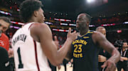 Golden State Warriors forward Draymond Green greets Houston Rockets forward Amen Thompson during the 2025 NBA Playoffs 