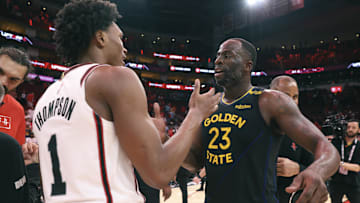 Golden State Warriors forward Draymond Green greets Houston Rockets forward Amen Thompson during the 2025 NBA Playoffs 