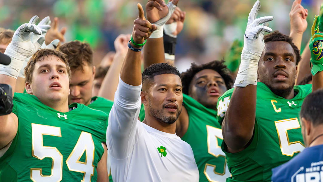 Oct 4, 2025; South Bend, Indiana, USA; Notre Dame Fighting Irish head coach Marcus Freeman sings the Alma Mater after beating the Boise State Broncos at Notre Dame Stadium. Mandatory Credit: Michael Caterina-Imagn Images Oct 4, 2025; South Bend, Indiana, USA; Notre Dame Fighting Irish head coach Marcus Freeman sings the Alma Mater after beating the Boise State Broncos at Notre Dame Stadium. Mandatory Credit: Michael Caterina-Imagn Images