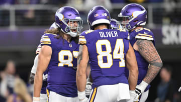 T.J. Hockenson, Josh Oliver, and Dalton Risner