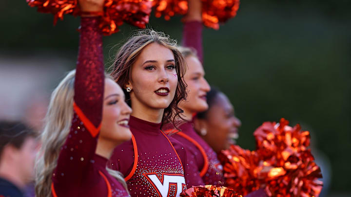 Sep 7, 2024; Blacksburg, Virginia, USA; The Virginia Tech Hokies cheerleaders look on during the game between the Virginia Tech Hokies and the Marshall Thundering Herd at Lane Stadium. Mandatory Credit: Peter Casey-Imagn Images