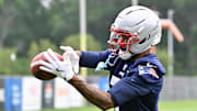 Jun 9, 2025; Foxborough, MA, USA; New England Patriots cornerback Carlton Davis III (7) makes a catch during minicamp at Gillette Stadium. Mandatory Credit: Eric Canha-Imagn Images