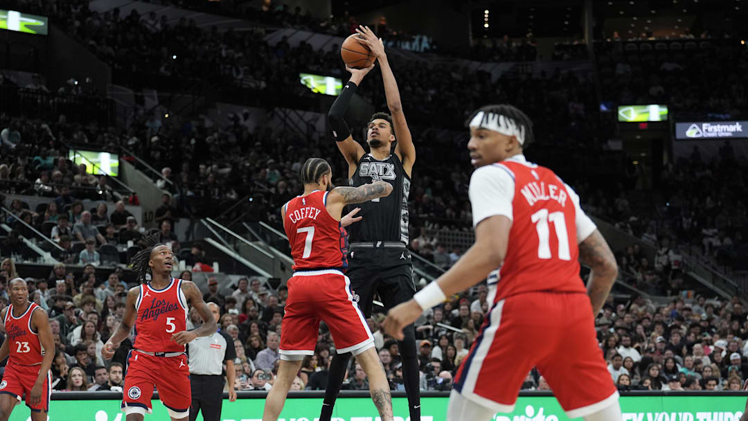 Dec 31, 2024; San Antonio, Texas, USA;  San Antonio Spurs center Victor Wembanyama (1) shoots over LA Clippers guard Amir Coffey (7) in the second half at Frost Bank Center. Mandatory Credit: Daniel Dunn-Imagn Images
