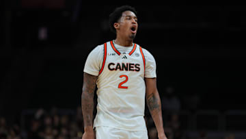 Feb 1, 2025; Coral Gables, Florida, USA; Miami Hurricanes forward Brandon Johnson (2) reacts after scoring against the Notre Dame Fighting Irish during the second half at Watsco Center. Mandatory Credit: Sam Navarro-Imagn Images