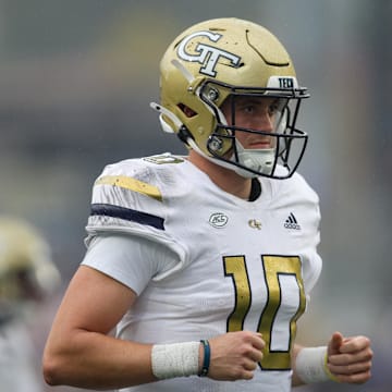 Sep 14, 2024; Atlanta, Georgia, USA; Georgia Tech Yellow Jackets quarterback Haynes King (10) celebrates after a touchdown throw against the Virginia Military Institute Keydets in the second quarter at Bobby Dodd Stadium at Hyundai Field. Mandatory Credit: Brett Davis-Imagn Images