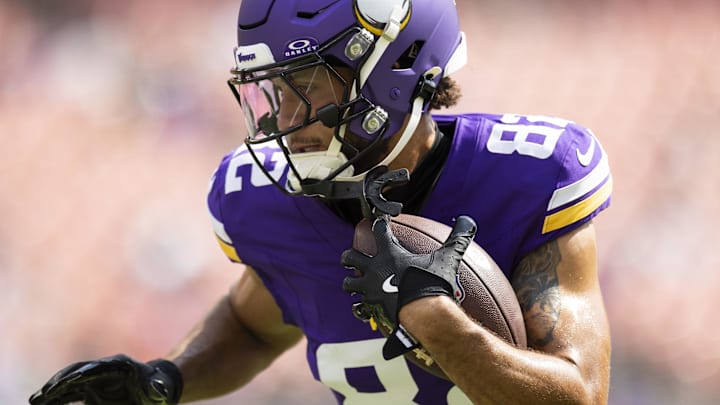 Aug 17, 2024; Cleveland, Ohio, USA; Minnesota Vikings wide receiver Jeshaun Jones (82) runs the ball during warm ups before the game against the Cleveland Browns at Cleveland Browns Stadium. Mandatory Credit: Scott Galvin-Imagn Images