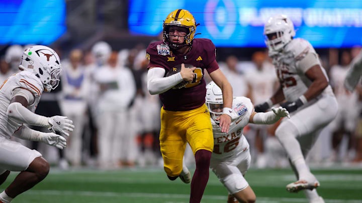 Jan 1, 2025; Atlanta, GA, USA; Arizona State Sun Devils quarterback Sam Leavitt (10) scrambles against the Texas Longhorns in overtime at Mercedes-Benz Stadium. Mandatory Credit: Brett Davis-Imagn Images