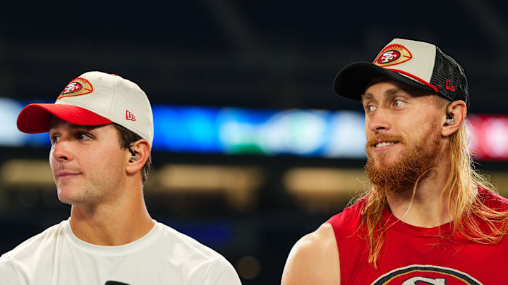 San Francisco 49ers quarterback Brock Purdy (L) and tight end George Kittle (R)
