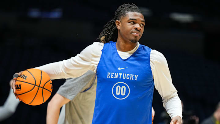 Kentucky Wildcats guard Otega Oweh (00) warms-up Thursday, March 27, 2025, during practice ahead of the Sweet 16 March Madness tournament game against the Tennessee Volunteers at Lucas Oil Stadium in Indianapolis. Kentucky Wildcats guard Otega Oweh (00) warms-up Thursday, March 27, 2025, during practice ahead of the Sweet 16 March Madness tournament game against the Tennessee Volunteers at Lucas Oil Stadium in Indianapolis.