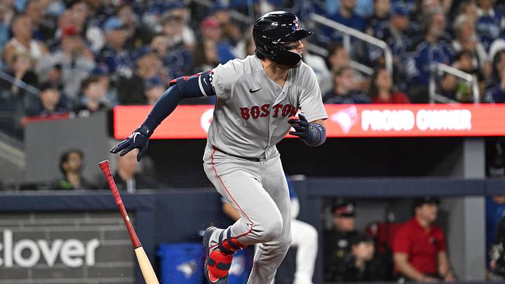 Apr 27, 2026; Toronto, Ontario, CAN;  Boston Red Sox second baseman Marcelo Mayer (11) hits an RBI single against the Toronto Blue Jays in the fourth inning at Rogers Centre. Mandatory Credit: Dan Hamilton-Imagn Images