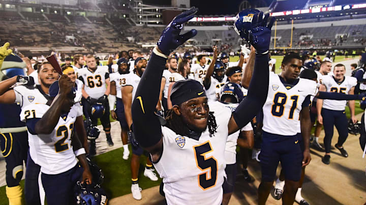 Toledo Rockets players react after defeating the Mississippi State Bulldogs at Davis Wade Stadium at Scott Field. 