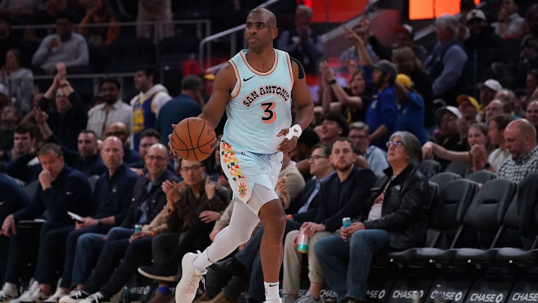 San Antonio Spurs guard Chris Paul dribbles up court against the Golden State Warriors in the third quarter at Chase Center in San Francisco on April 9, 2025.