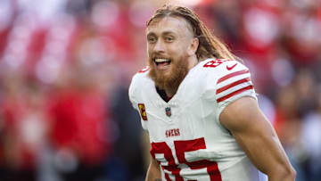 Jan 5, 2025; Glendale, Arizona, USA; San Francisco 49ers tight end George Kittle (85) against the Arizona Cardinals at State Farm Stadium. Mandatory Credit: Mark J. Rebilas-Imagn Images