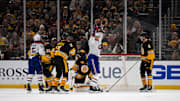 Dec 1, 2024; Boston, Massachusetts, USA; Montreal Canadiens defenseman Kaiden Guhle (21) celebrates a third period goal against Boston Bruins at TD Garden. Mandatory Credit: Natalie Reid-Imagn Images