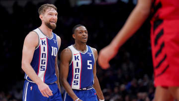 Apr 14, 2024; Sacramento, California, USA; Sacramento Kings forward Domantas Sabonis (10) and guard De'Aaron Fox (5) walk on the court during a break in the action against the Portland Trail Blazers in the third quarter at the Golden 1 Center. Mandatory Credit: Cary Edmondson-USA TODAY Sports
