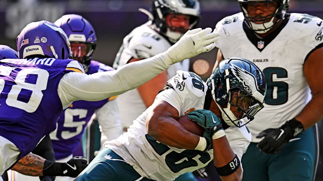 Oct 19, 2025; Minneapolis, Minnesota, USA; Philadelphia Eagles running back Saquon Barkley (26) controls the ball during the second half against the Minnesota Vikings at U.S. Bank Stadium. Mandatory Credit: Jeffrey Becker-Imagn Images
