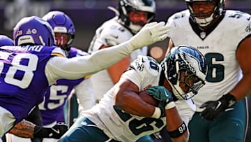 Oct 19, 2025; Minneapolis, Minnesota, USA; Philadelphia Eagles running back Saquon Barkley (26) controls the ball during the second half against the Minnesota Vikings at U.S. Bank Stadium. Mandatory Credit: Jeffrey Becker-Imagn Images