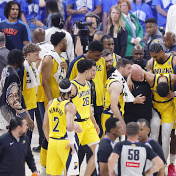 Jun 22, 2025; Oklahoma City, Oklahoma, USA; Indiana Pacers guard Tyrese Haliburton (0) is assisted after an apparent injury following a play against the Oklahoma City Thunder during the first half of game seven of the 2025 NBA Finals at Paycom Center. Mandatory Credit: Alonzo Adams-Imagn Images