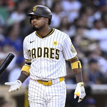 Aug 24, 2024; San Diego, California, USA; San Diego Padres first baseman Luis Arraez (4) flips his bat during the fifth inning against the New York Mets at Petco Park. Mandatory Credit: Orlando Ramirez-USA TODAY Sports