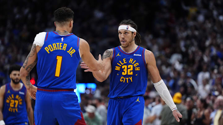 May 9, 2025; Denver, Colorado, USA; Denver Nuggets forward Aaron Gordon (32) celebrates his three point score with forward Michael Porter Jr. (1) in the fourth quarter against the Oklahoma City Thunder during game three of the second round for the 2025 NBA Playoffs at Ball Arena. Mandatory Credit: Ron Chenoy-Imagn Images May 9, 2025; Denver, Colorado, USA; Denver Nuggets forward Aaron Gordon (32) celebrates his three point score with forward Michael Porter Jr. (1) in the fourth quarter against the Oklahoma City Thunder during game three of the second round for the 2025 NBA Playoffs at Ball Arena. Mandatory Credit: Ron Chenoy-Imagn Images