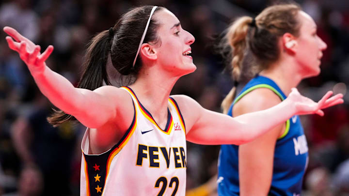 Indiana Fever guard Caitlin Clark (22) reacts to a call Friday, Sept. 6, 2024, during a game between the Indiana Fever and the Minnesota Lynx at Gainbride Fieldhouse in Indianapolis. The Lynx defeated the Fever, 99-88.