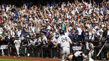 Apr 3, 2024; Phoenix, Arizona, USA; New York Yankees fans in the crowd celebrate as outfielder Alex