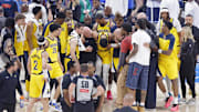 Indiana Pacers guard Tyrese Haliburton is assisted after an apparent injury following a play against the Oklahoma City Thunder during the first half of game seven of the 2025 NBA Finals at Paycom Center. 