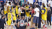 Indiana Pacers guard Tyrese Haliburton is assisted after an apparent injury following a play against the Oklahoma City Thunder during the first half of game seven of the 2025 NBA Finals at Paycom Center. 