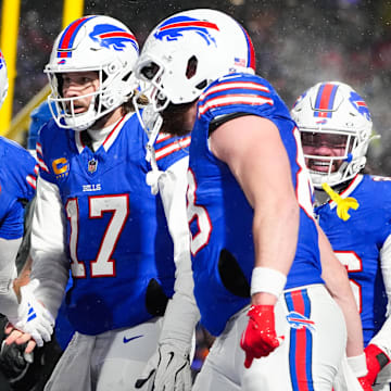 Buffalo Bills quarterback Josh Allen celebrates with wide receiver Khalil Shakir after scoring a touchdown during the second quarter against the Baltimore Ravens.