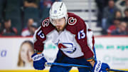 Mar 12, 2024; Calgary, Alberta, CAN; Colorado Avalanche right wing Valeri Nichushkin (13) during the face off against the Calgary Flames during the third period at Scotiabank Saddledome. Mandatory Credit: Sergei Belski-Imagn Images