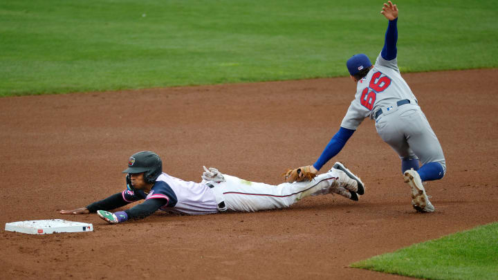 Rochester’s Darren Baker is tagged out by Buffalo’s Rafael Lantigua trying to steal second base.