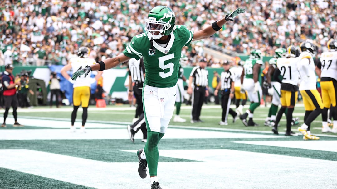 Sep 7, 2025; East Rutherford, New Jersey, USA; New York Jets wide receiver Garrett Wilson (5) celebrates during the second half against the Pittsburgh Steelers at MetLife Stadium. Mandatory Credit: Wendell Cruz-Imagn Images