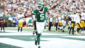 Sep 7, 2025; East Rutherford, New Jersey, USA; New York Jets wide receiver Garrett Wilson (5) celebrates during the second half against the Pittsburgh Steelers at MetLife Stadium. Mandatory Credit: Wendell Cruz-Imagn Images