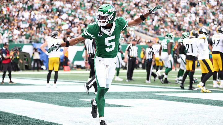 Sep 7, 2025; East Rutherford, New Jersey, USA; New York Jets wide receiver Garrett Wilson (5) celebrates during the second half against the Pittsburgh Steelers at MetLife Stadium. Mandatory Credit: Wendell Cruz-Imagn Images