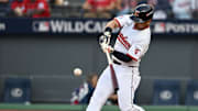 Oct 2, 2025; Cleveland, Ohio, USA; Cleveland Guardians outfielder Steven Kwan (38) hits a double in the eighth inning against the Detroit Tigers during game three of the Wildcard round for the 2025 MLB playoffs at Progressive Field. Mandatory Credit: Ken Blaze-Imagn Images