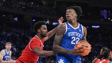Dec 21, 2024; New York, New York, USA; Kentucky Wildcats center Amari Williams (22) posts up against Ohio State Buckeyes forward Sean Stewart (13) during the first half at Madison Square Garden. Mandatory Credit: John Jones-Imagn Images