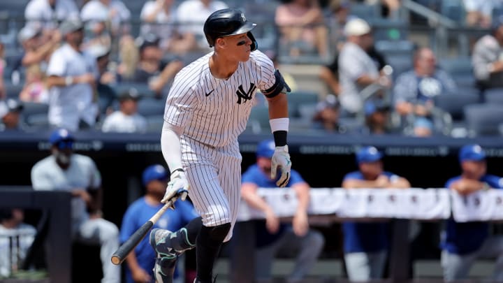 Aug 3, 2024; Bronx, New York, USA; New York Yankees designated hitter Aaron Judge (99) watches his two run home run against the Toronto Blue Jays during the first inning at Yankee Stadium. Mandatory Credit: Brad Penner-USA TODAY Sports