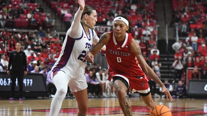 Texas Tech's Snudda Collins dribbles against TCU in a Big 12 women's basketball game Sunday, Feb. 1, 2026, at United Supermarkets Arena.