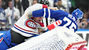Oct 11, 2023; Toronto, Ontario, CAN; Toronto Maple Leafs right wing Ryan Reaves (75) fights with Montreal Canadiens defenseman Arber Xhekaj (72) during the first period at Scotiabank Arena. Mandatory Credit: Nick Turchiaro-Imagn Images