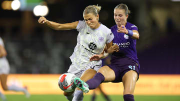 Aug 1, 2024; Orlando, Florida, USA; Racing Louisville FC midfielder Kayla Fischer (9) battles Orlando Pride midfielder Coriana Dyke (31) for the ball in the second half at Inter&Co Stadium. Mandatory Credit: Nathan Ray Seebeck-USA TODAY Sports
